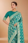 Buy_Samyukta Singhania_Turquoise Zari Round Neck Woven Banarasi Silk Saree With Blouse _Online_at_Aza_Fashions