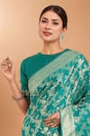 Samyukta Singhania_Turquoise Zari Round Neck Woven Banarasi Silk Saree With Blouse _at_Aza_Fashions