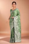 Buy_Samyukta Singhania_Green Embroidery, Zari V-neck Woven Banarasi Silk Saree With Blouse _at_Aza_Fashions