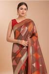 Samyukta Singhania_Red Tassels V-neck Zari Woven Banarasi Silk Saree With Blouse _at_Aza_Fashions