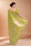 Shop_Samyukta Singhania_Green Tassels, Zari Round Neck Woven Banarasi Silk Saree With Blouse _at_Aza_Fashions
