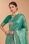 Buy_Samyukta Singhania_Turquoise Tassels, Zari V-neck Woven Banarasi Silk Saree With Blouse _Online_at_Aza_Fashions