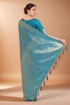 Shop_Samyukta Singhania_Sky Blue Tassels V-neck Zari Woven Banarasi Silk Saree With Blouse _at_Aza_Fashions