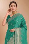 Samyukta Singhania_Turquoise Zari V-neck Woven Banarasi Saree With Blouse _at_Aza_Fashions
