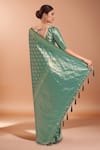 Shop_Samyukta Singhania_Turquoise Tassels V-neck Zari Woven Banarasi Saree With Blouse _at_Aza_Fashions