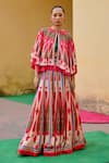 Buy_Swati Vijaivargie_Red Linen, Satin Round Neck Color Block Cape Lehenga Set _at_Aza_Fashions
