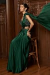Istya_Emerald Green Satin Sequins Round Neck Pre-draped Saree With Embellished Blouse _Online_at_Aza_Fashions