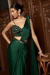 Shop_Istya_Emerald Green Satin Sequins Round Neck Pre-draped Saree With Embellished Blouse _Online_at_Aza_Fashions
