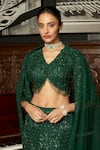 Buy_Istya_Emerald Green Net Sequins, Embroidery V-neck Fishcut Lehenga Set _Online_at_Aza_Fashions