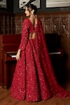 Shop_Istya_Red Net Sequins, Embroidery Plunge Neck Bridal Lehenga Set _at_Aza_Fashions