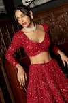 Shop_Istya_Red Net Sequins, Embroidery Plunge Neck Bridal Lehenga Set _Online_at_Aza_Fashions