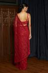 Shop_Istya_Red Net Sequins, Beads Sweetheart Neck Statement Embellished Saree With Blouse _at_Aza_Fashions