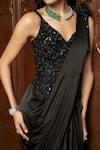 Istya_Black Satin Sequins, Beads Sweetheart Neck Corset With Pre-draped Saree _at_Aza_Fashions