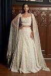 Buy_Istya_Off White Net Beads, Sequins, Crystals, Embroidery, Grey Embellished Lehenga Set _at_Aza_Fashions