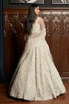 Shop_Istya_Off White Net Beads, Sequins, Crystals, Embroidery, Grey Embellished Lehenga Set _at_Aza_Fashions