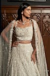 Buy_Istya_Off White Net Beads, Sequins, Crystals, Embroidery, Grey Embellished Lehenga Set _Online_at_Aza_Fashions