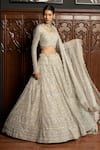 Istya_Gray Net Sequins, Beads, Embroidery Scoop Grey Embellished Bridal Lehenga Set _at_Aza_Fashions