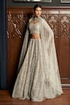 Buy_Istya_Gray Net Sequins, Beads, Embroidery Scoop Grey Embellished Bridal Lehenga Set _at_Aza_Fashions