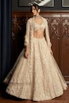 Istya_Beige Net Sequins, Beads Round Neck Embellished Lehenga Set _Online_at_Aza_Fashions