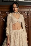 Shop_Istya_Beige Net Sequins, Beads Round Neck Embellished Lehenga Set _Online_at_Aza_Fashions