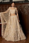 Buy_Istya_Beige Net Embroidery, Sequins, Beads Scoop Neck Embellished Lehenga Set _at_Aza_Fashions