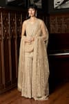 Buy_Istya_Beige Net Sequins, Embroidery V-neck Embellished Kurta Sharara Set _at_Aza_Fashions