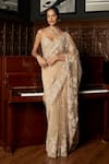 Buy_Istya_Beige Net Beads, Sequins, Embroidery Sweetheart Neck Saree With Blouse _at_Aza_Fashions