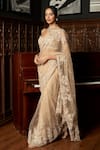 Istya_Beige Net Beads, Sequins, Embroidery Sweetheart Neck Saree With Blouse _Online_at_Aza_Fashions