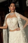 Istya_Ivory Net Sequins, Embroidery Embellished Fish Cut Lehenga Set _Online_at_Aza_Fashions