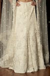 Shop_Istya_Ivory Net Sequins, Embroidery Embellished Fish Cut Lehenga Set _Online_at_Aza_Fashions