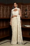 Buy_Istya_Ivory Net Beads, Embroidery High Neck Embellished Saree Set With Cape _at_Aza_Fashions