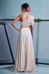 Shop_Muditaa By Urmila_Pink Net, Crepe Embroidery, Fabric Flowers One Shoulder Kaya Yoke Jumpsuit _at_Aza_Fashions