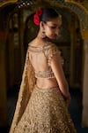 Shop_Seema Gujral_Gold Organza, Tissue, Silk Sequins Round Neck Tonal Embroidered Lehenga Set _at_Aza_Fashions