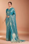 Buy_Samyukta Singhania_Sky Blue Tassels V-neck Zari Woven Banarasi Silk Saree With Blouse _at_Aza_Fashions