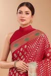 Samyukta Singhania Red Tassels High Neck Zari Woven Banarasi Silk Saree With Blouse at Aza Fashions Samyukta Singhania_Red Tassels High Neck Zari Woven Banarasi Silk Saree With Blouse _at_Aza_Fashions