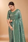 Buy_Samyukta Singhania_Turquoise Tassels V-neck Zari Woven Banarasi Saree With Blouse _Online_at_Aza_Fashions