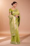 Samyukta Singhania_Green Tassels, Zari Round Neck Woven Banarasi Silk Saree With Blouse _at_Aza_Fashions