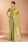 Buy_Samyukta Singhania_Green Tassels, Zari Round Neck Woven Banarasi Silk Saree With Blouse _at_Aza_Fashions