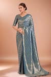 Buy_Samyukta Singhania_Blue Tassels, Zari V-neck Woven Banarasi Satin Silk Saree With Blouse _at_Aza_Fashions