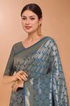 Samyukta Singhania_Blue Tassels, Zari V-neck Woven Banarasi Satin Silk Saree With Blouse _at_Aza_Fashions