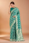 Buy_Samyukta Singhania_Turquoise Zari Round Neck Woven Banarasi Silk Saree With Blouse _at_Aza_Fashions