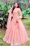Buy_Amaltas Couture_Peach Net Sequins Round Neck Work Lehenga Set _Online_at_Aza_Fashions