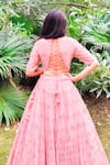 Shop_Amaltas Couture_Peach Net Sequins Round Neck Work Lehenga Set _at_Aza_Fashions