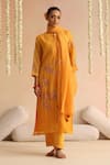 Buy_Beige_Orange Cotton Satin Beads, Sequins Round Neck Flower Embroidered Kurta Pant Set _at_Aza_Fashions