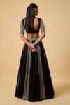 Shop_Monk & Mei By Sonia Anand_Black Georgette, Cotton Satin Sequins, Zari Round Laxmi Lehenga Set With Potli _at_Aza_Fashions