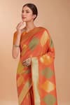 Shop_Samyukta Singhania_Orange Tassels V-neck Zari Woven Banarasi Silk Saree With Blouse _Online_at_Aza_Fashions