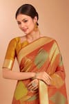 Samyukta Singhania_Orange Tassels V-neck Zari Woven Banarasi Silk Saree With Blouse _at_Aza_Fashions