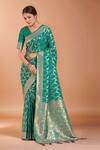 Buy_Samyukta Singhania_Turquoise Zari V-neck Woven Banarasi Saree With Blouse _at_Aza_Fashions
