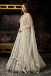 Diyarajvvir Ivory Tulle Sequins, Beads, Embroidery V-neck Embellished Lehenga Set Online at Aza Fashions Diyarajvvir_Ivory Tulle Sequins, Beads, Embroidery V-neck Embellished Lehenga Set _Online_at_Aza_Fashions