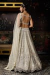 Shop Diyarajvvir Ivory Tulle Sequins, Beads, Embroidery V-neck Embellished Lehenga Set at Aza Fashions Shop_Diyarajvvir_Ivory Tulle Sequins, Beads, Embroidery V-neck Embellished Lehenga Set _at_Aza_Fashions